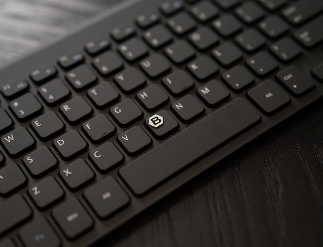 Black keyboard with Basis logo on the B key