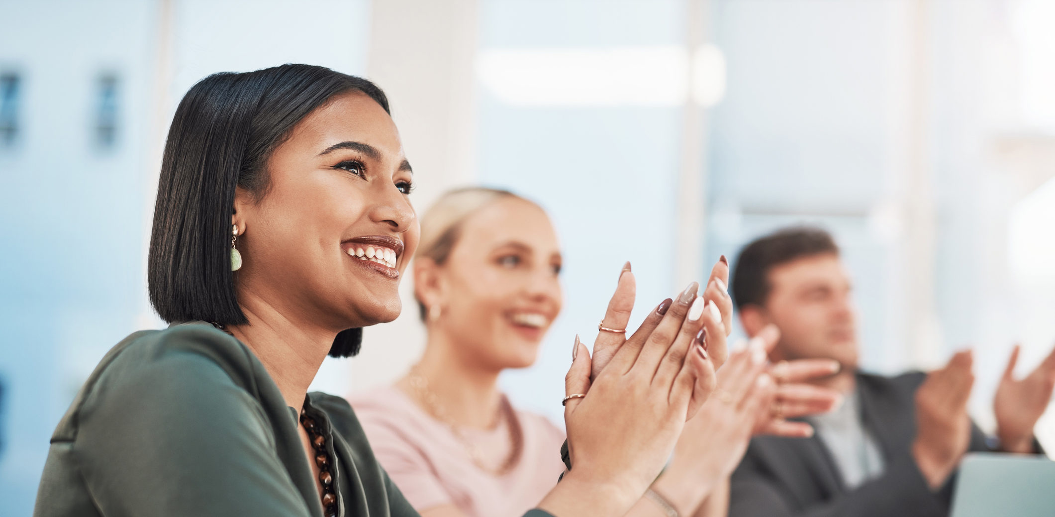 Group of digital marketers clapping