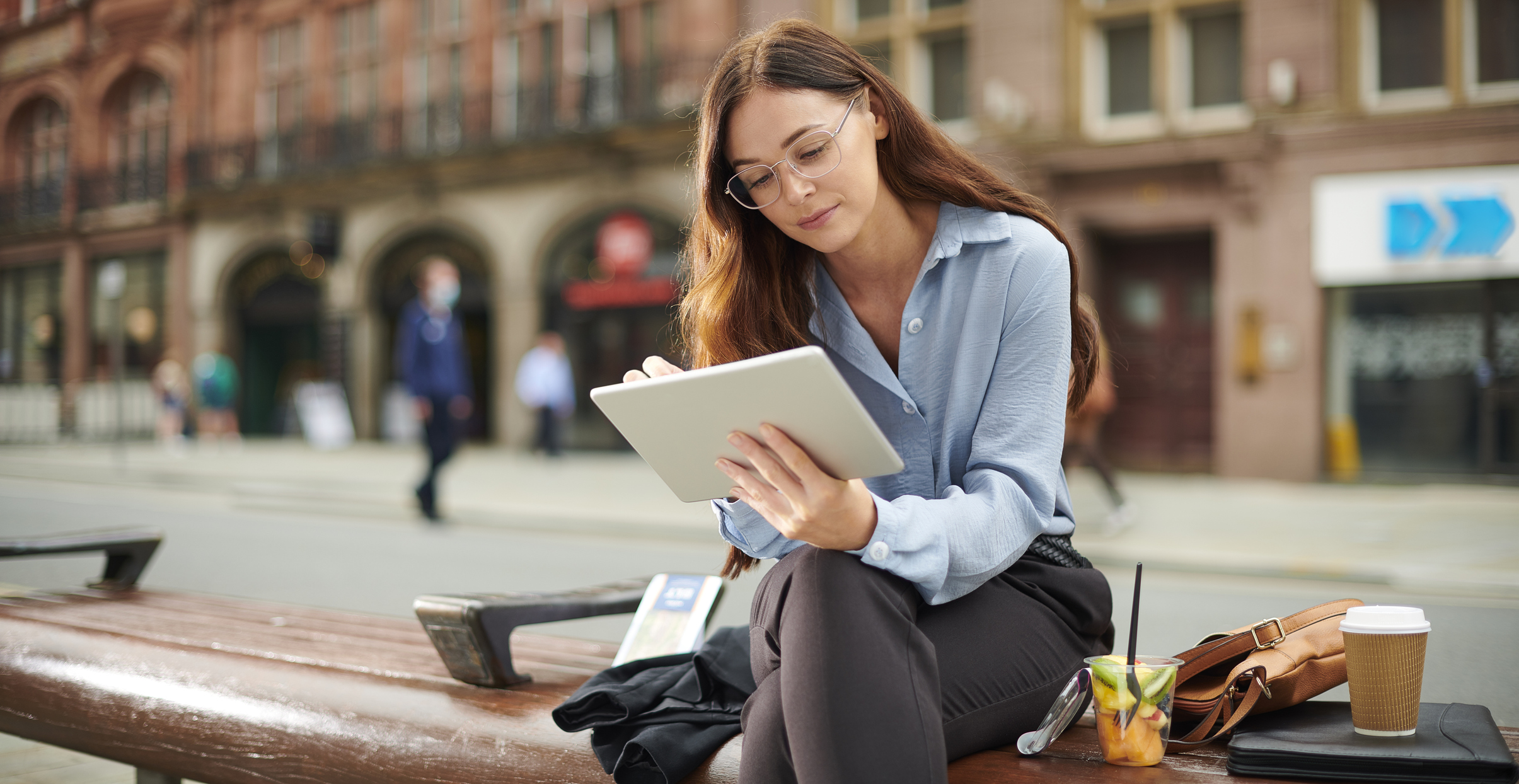 Professional woman reaching from her tablet