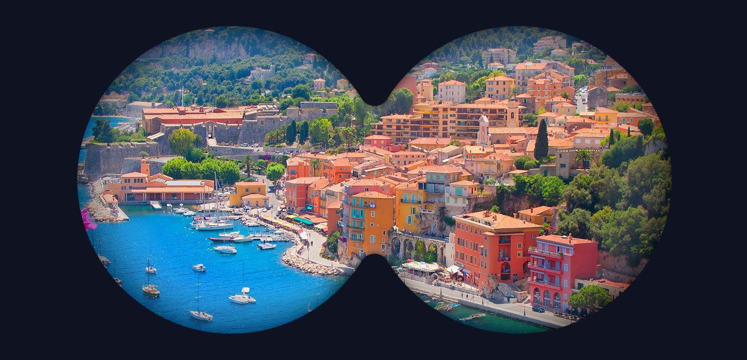 Through the lens of a binoculars, a view of the French Riviera (where Cannes Lions takes place)