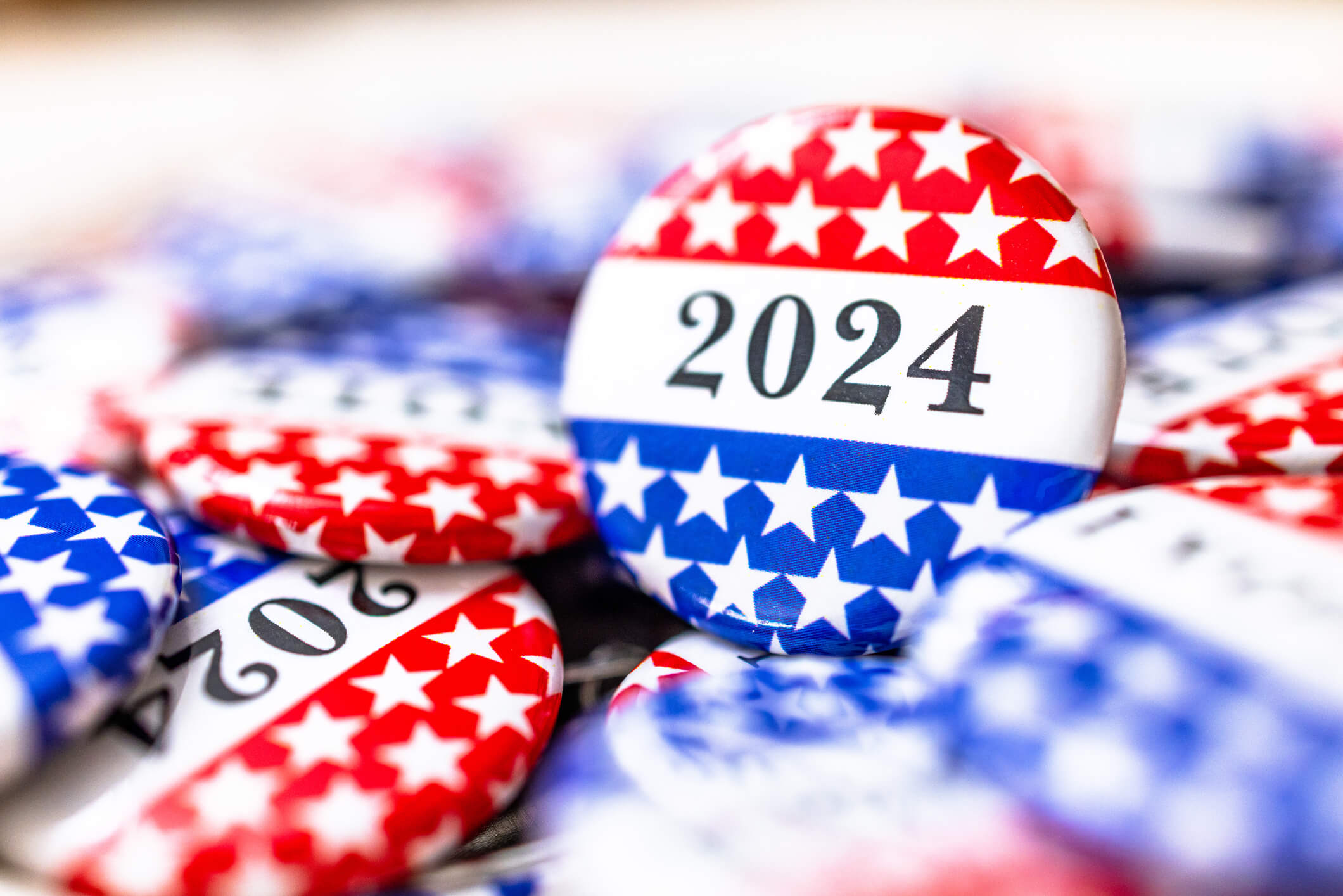 Closeup of election vote button with text that says 2024