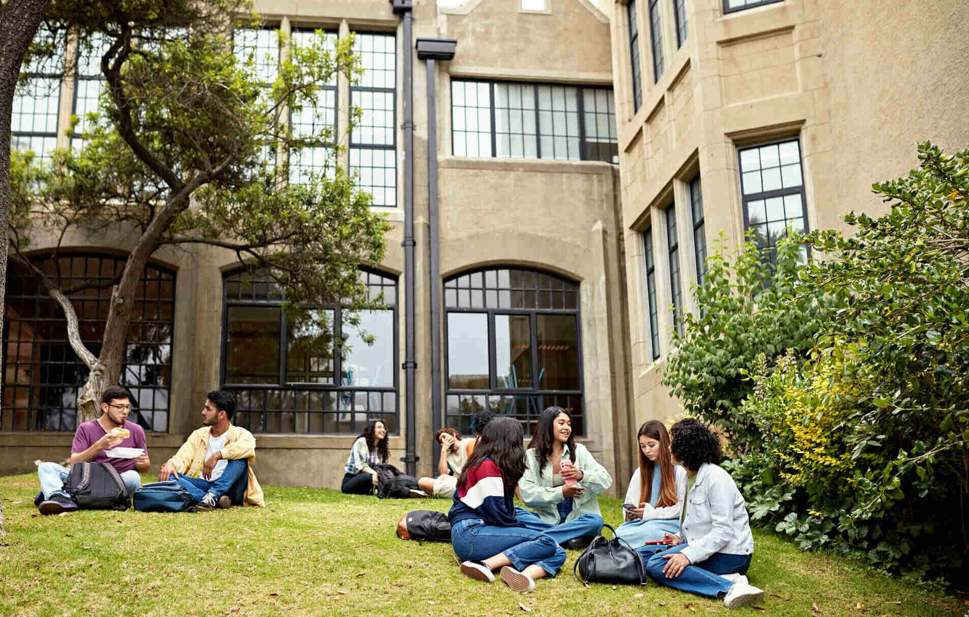 University students taking a break on campus between classes