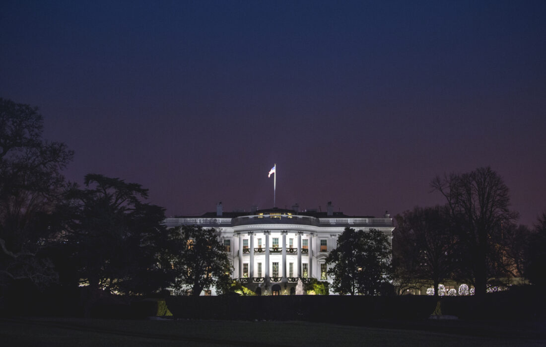 The White House at night during the holiday season