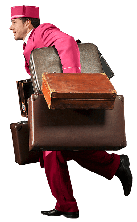 Bellhop holding bags