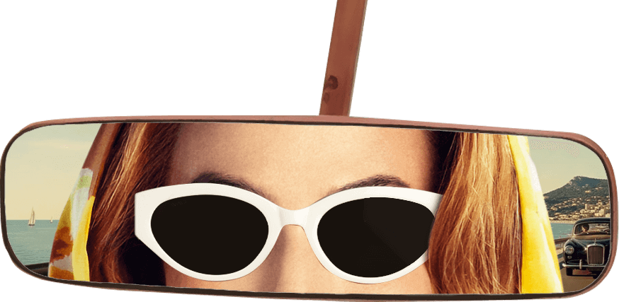 rearview mirror with Eleanor wearing sunglasses