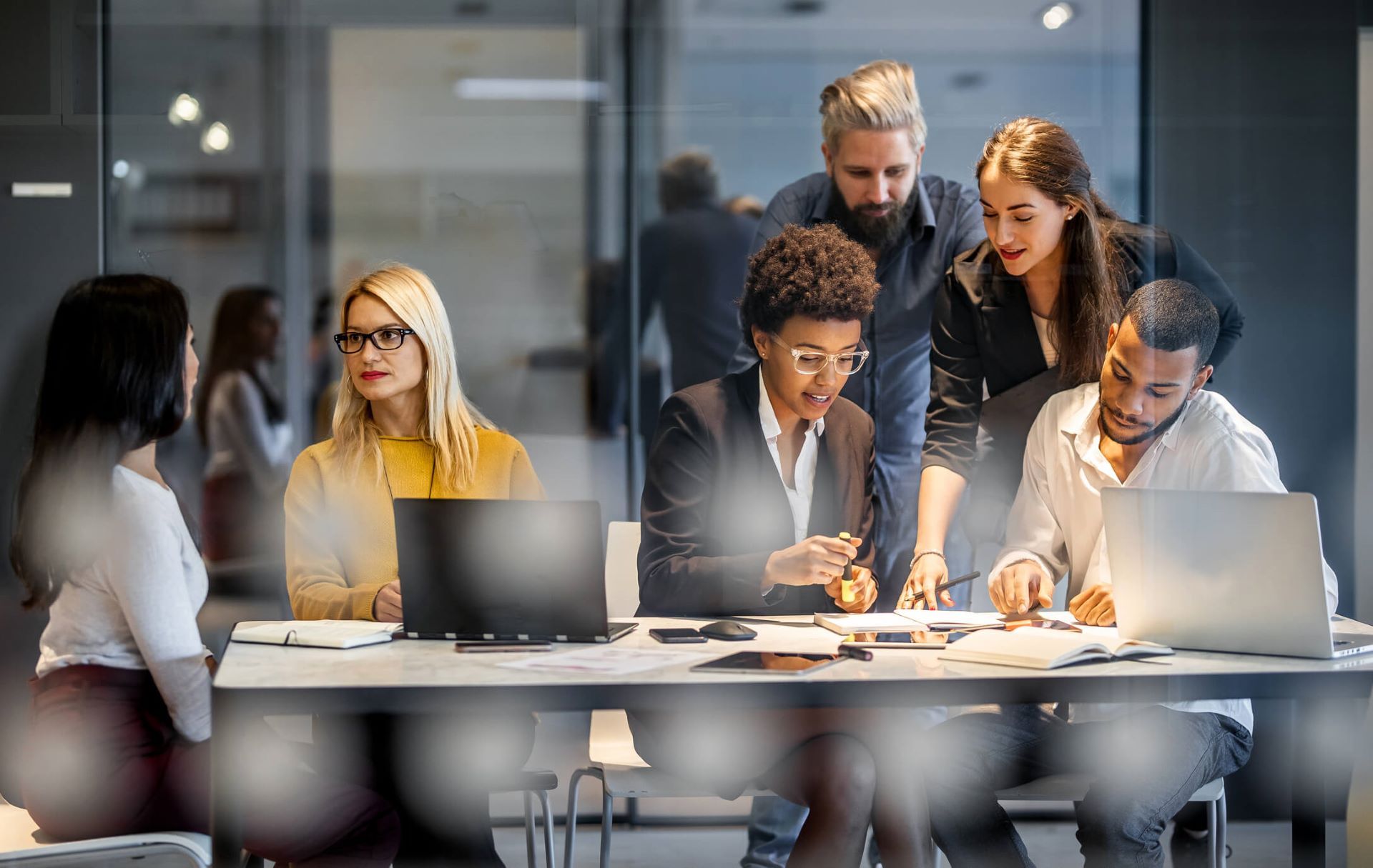 An image showing an agency team working together on an advertising campaign