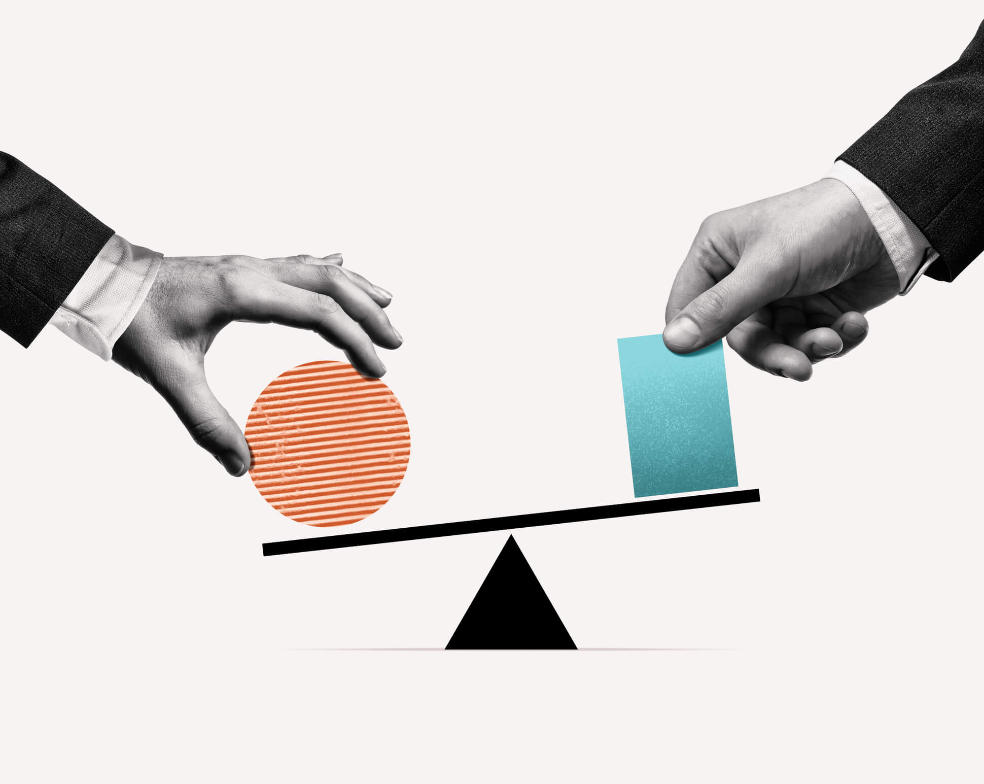 Two different shapes being balanced on a scale