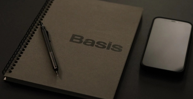 notebook that says Basis on it